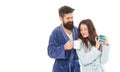 Man and woman wear bathrobes hold tea mug or coffee cup. Caffeine power concept. With coffee morning tastes better