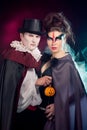 Man and woman wearing as vampire and witch. Halloween Royalty Free Stock Photo