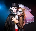 Man and woman wearing as vampire and witch. Halloween Royalty Free Stock Photo