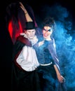 Man and woman wearing as vampire and witch. Halloween Royalty Free Stock Photo