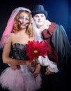 Man and woman wearing as vampire and witch. Halloween Royalty Free Stock Photo