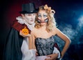 Man and woman wearing as vampire and witch. Halloween Royalty Free Stock Photo