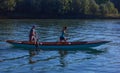 A man and a woman who train to row at the historic Venetian regatta.