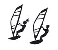 Man and woman windsurfing silhouettes