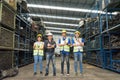 Man and woman work together, diversity of full body of Caucasian and Asian engineer workers stand and give thumbs up in factory-