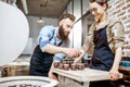 Man and woman working with ceramics at the pottery Royalty Free Stock Photo