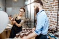 Man and woman working with ceramics at the pottery Royalty Free Stock Photo