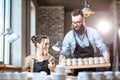 Man and woman working in the pottery shop Royalty Free Stock Photo