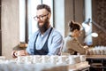 Man and woman working in the pottery shop Royalty Free Stock Photo