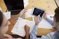 Man and woman working with tablet computer, high angleÃ¯Â¿Â½ Royalty Free Stock Photo