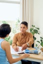 Man and woman working together in an architect office Royalty Free Stock Photo