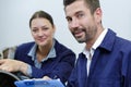 Man and woman working in workshop Royalty Free Stock Photo