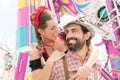 Man and woman in Tracht on the Oktoberfest in Munich