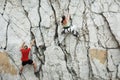 Man and women climbing