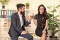 Man and woman conversation coffee time. Office rumors. Office coffee. Couple coworkers relax coffee break. Share coffee Royalty Free Stock Photo