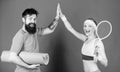 Man and woman couple in love with yoga mat and sport equipment. Fitness exercises. Workout and fitness. Girl and guy Royalty Free Stock Photo