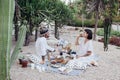 Couple on romantic date lay on picnic blanket Royalty Free Stock Photo