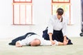 Man and woman fighting at Aikido martial arts school Royalty Free Stock Photo