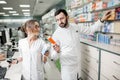 Pharmacists working in the pharmacy store Royalty Free Stock Photo