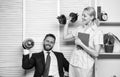 Man and woman raise heavy dumbbells. Strong powerful business strategy. Good job concept. Boss businessman and office Royalty Free Stock Photo