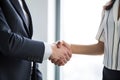 Man and women shaking hands after an interview. AI generated Royalty Free Stock Photo