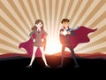 Man and women superhero with sunlight. Royalty Free Stock Photo