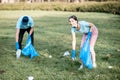 Volunteers cleaning public park from the rubbish