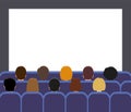 Man and women watching a movie. Back view. People in the movie theater or movie screening room. Royalty Free Stock Photo