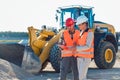 Man and woman worker on construction site Royalty Free Stock Photo