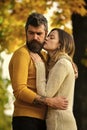 Man and woman at yellow tree leaves Royalty Free Stock Photo