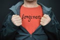 A man with the word forgiven on his t-shirt Royalty Free Stock Photo