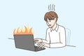 Man work on burning computer
