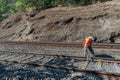 Man at work on Central railway Rail track maintenance worker at work khandala western ghats