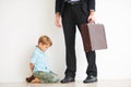 Man, work and child on floor with sad, love and care by businessman for fear, anxiety and tantrum. Father, tired and