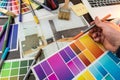Man work with Color palette and house apartament sketch for creative design home Royalty Free Stock Photo