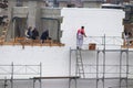 Man at work, construction of new building in progress Royalty Free Stock Photo