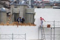 Man at work, construction of new building in progress Royalty Free Stock Photo