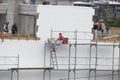 Man at work, construction of new building in progress