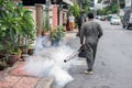 Man work fogging to eliminate mosquito and zika virus