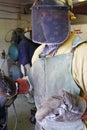 Man at work in the Foundry wearing protective gear