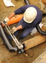 Man at work on gas pipe Royalty Free Stock Photo