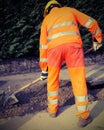 Man at work with high visibility clothing with vintage effect Royalty Free Stock Photo