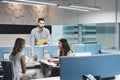 Man At Work Ignored by Female Colleagues In Coworking Space