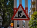 Man At Work Sign On Road Royalty Free Stock Photo