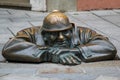 The `Man at Work` statue called Cumil, in Bratislava`s old town, Slovakia Royalty Free Stock Photo