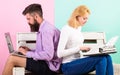 Man work use modern stylish laptop and woman work retro typewriter. Try new technology. Can not get used new Royalty Free Stock Photo