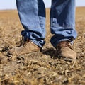 Man in workboots. Royalty Free Stock Photo