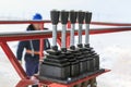 Man worker in a boom lift, machine control on the aerial platform Royalty Free Stock Photo