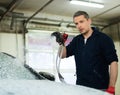 Man worker on a car wash Royalty Free Stock Photo