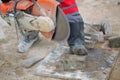 Man worker cutting concrete circular tool diamond blade Royalty Free Stock Photo